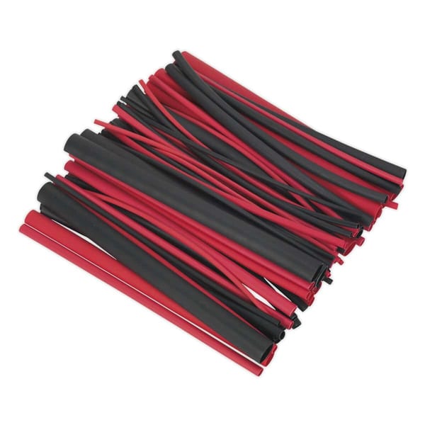 A collection of red and black heat shrink tubing, ideal for electrical insulation and protection, arranged in a disordered pile.