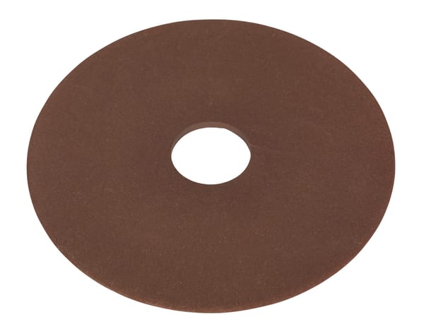 Brown rubber washer featuring a central hole, suitable for various applications including plumbing and machinery.