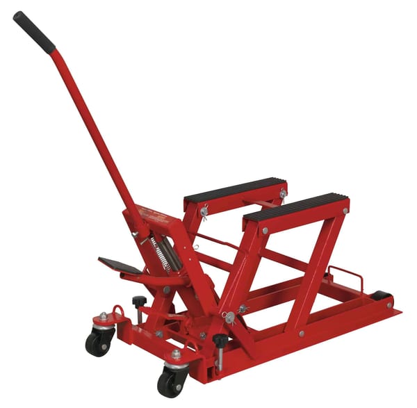Hydraulic motorcycle and quad lift with 680kg capacity for garage use.