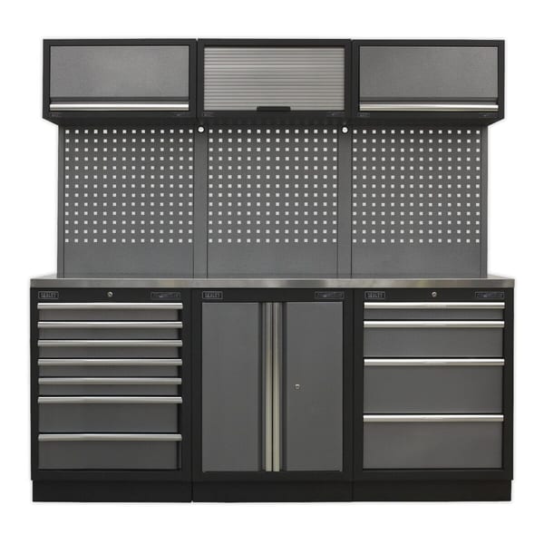 Heavy-duty garage storage unit with multiple drawers and cabinets, featuring a pegboard for tools and accessories.