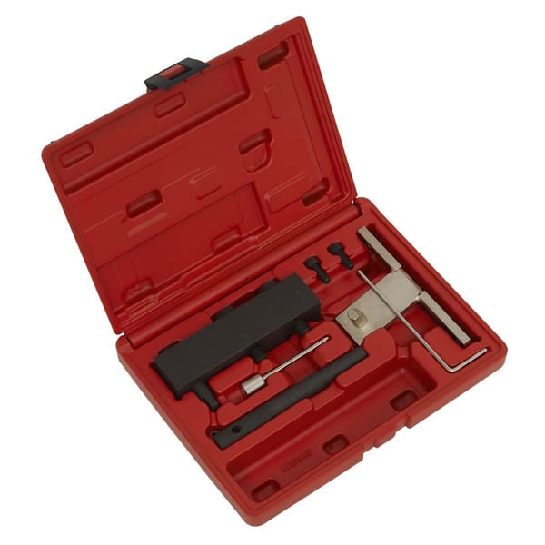 Engine timing tool set featuring various tools and accessories in a red plastic case for automotive repairs and maintenance.