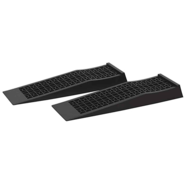 Pair of heavy-duty black vehicle wheel chocks designed for stability and safety during parking, made from durable materials.