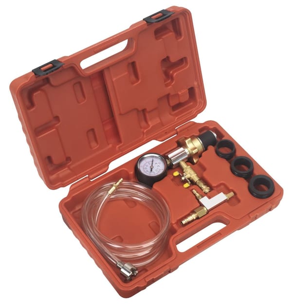 Cooling System Vacuum Purge & Refill Kit with gauge, hoses, and adapters in a sturdy case.