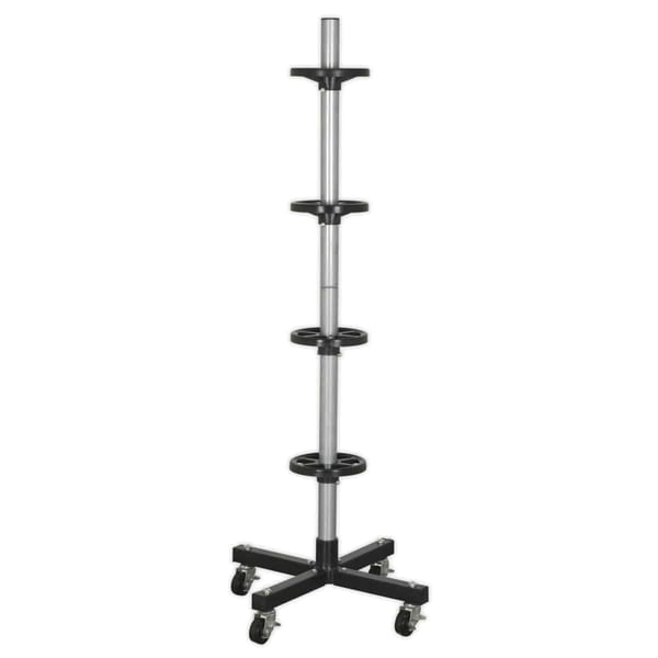 Multi-tiered rolling display stand with four shelves and a sturdy base, ideal for showcasing products or items.