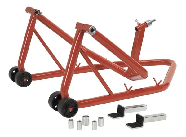 Front headstock stand for motorcycles with adjustable pins and sturdy wheels.