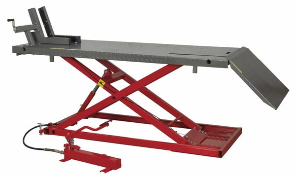 Heavy-duty air/hydraulic motorcycle lift with 680kg capacity for garage use.