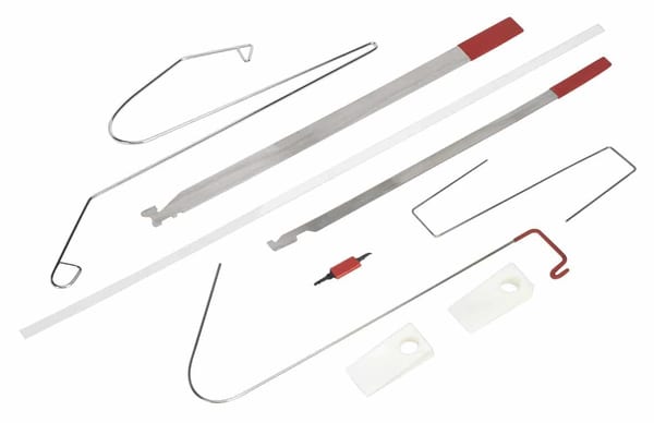 Emergency car opening kit with various tools for unlocking vehicles safely.