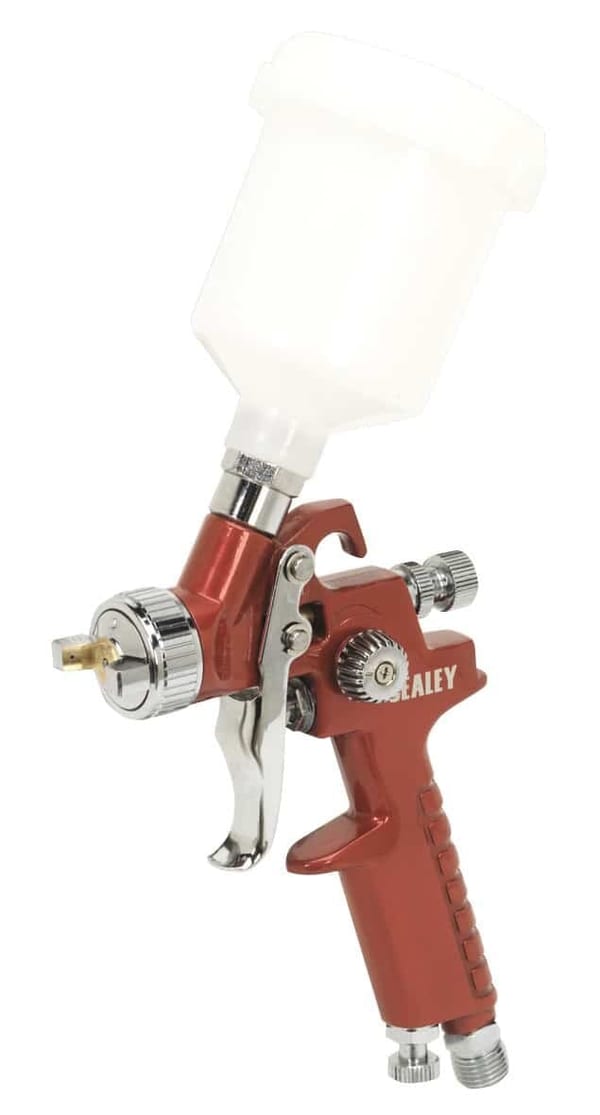 HVLP gravity feed touch-up spray gun 0.8mm setup for automotive painting.