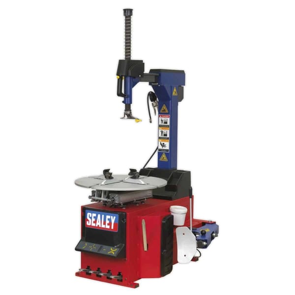 Sealey tyre changing machine with dual turntables and adjustable arm for efficient tyre fitting and removal, ideal for workshops.