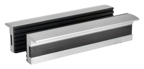 Aluminium and rubber door seals for effective insulation and weatherproofing, designed for durability and easy installation.