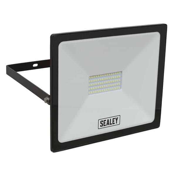 Sealey 50W LED floodlight with a square design, featuring a durable black frame and a bright LED panel for outdoor illumination.