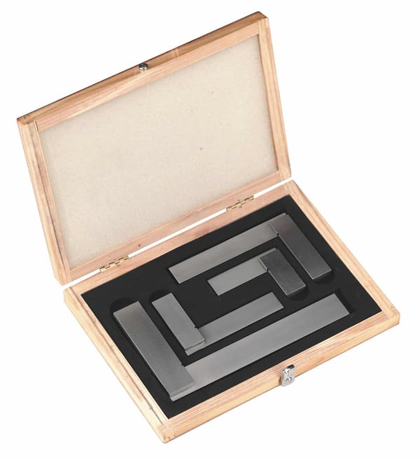 Precision Steel Square Set 4pc in wooden case for measuring and machining tasks.