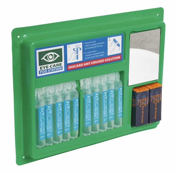 Eye wash station with pods, mirror, and safety instructions for first aid.