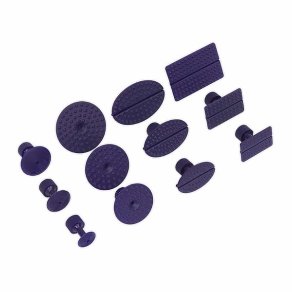 A collection of purple rubber stoppers and caps in various shapes and sizes, ideal for sealing and protecting surfaces.