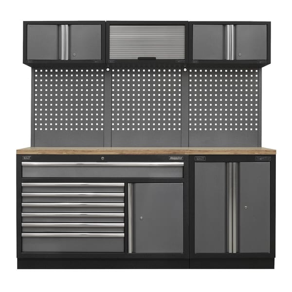 Heavy-duty garage storage unit with multiple drawers, cabinets, and a wooden worktop, ideal for tool organisation and workspace efficiency.