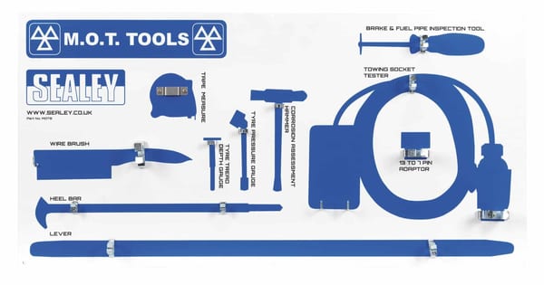 MOT tool board featuring various vehicle inspection tools on a white background.