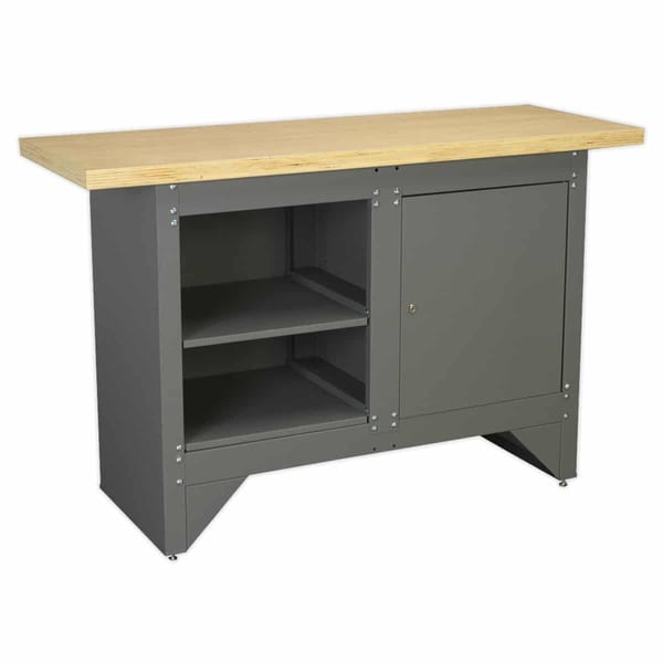 Heavy-duty workbench with cupboard and shelves for storage.
