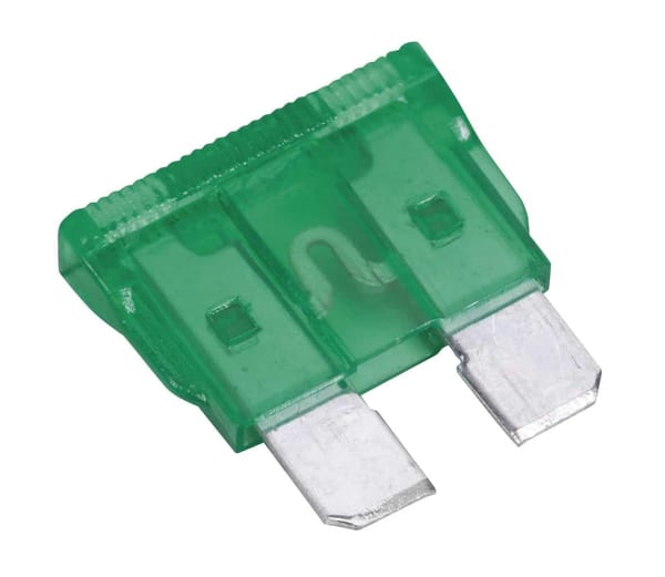 15 Amp green automotive fuse with metal terminals for electrical circuit protection in vehicles.