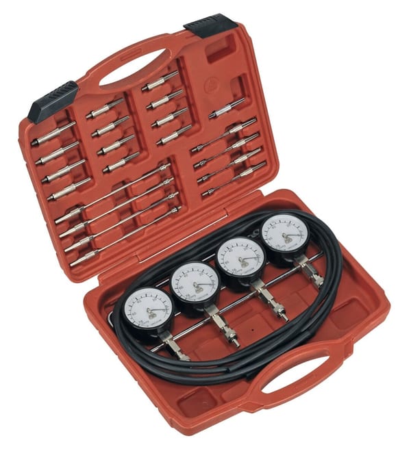 Mini carburettor synchronizer kit with gauges and accessories in a case
