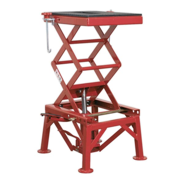 Red motorcycle lift for off-road and trials bikes, supports up to 135kg
