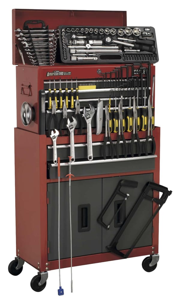 Topchest and rollcab combination with 6 drawers and 128-piece tool kit in red and grey.